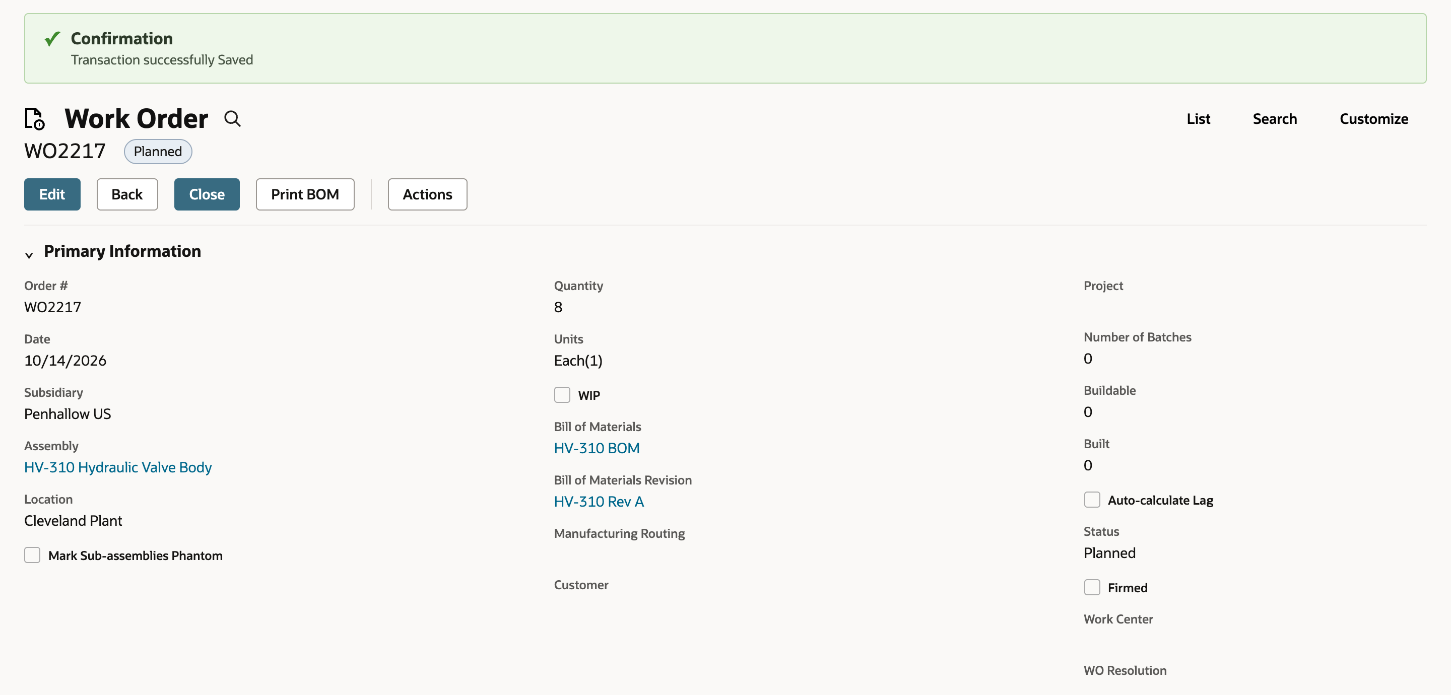 Saved work order WO2217 with a Planned badge and a Transaction successfully Saved confirmation. Quantity is 8, Built is 0, Status is Planned and Firmed is cleared.