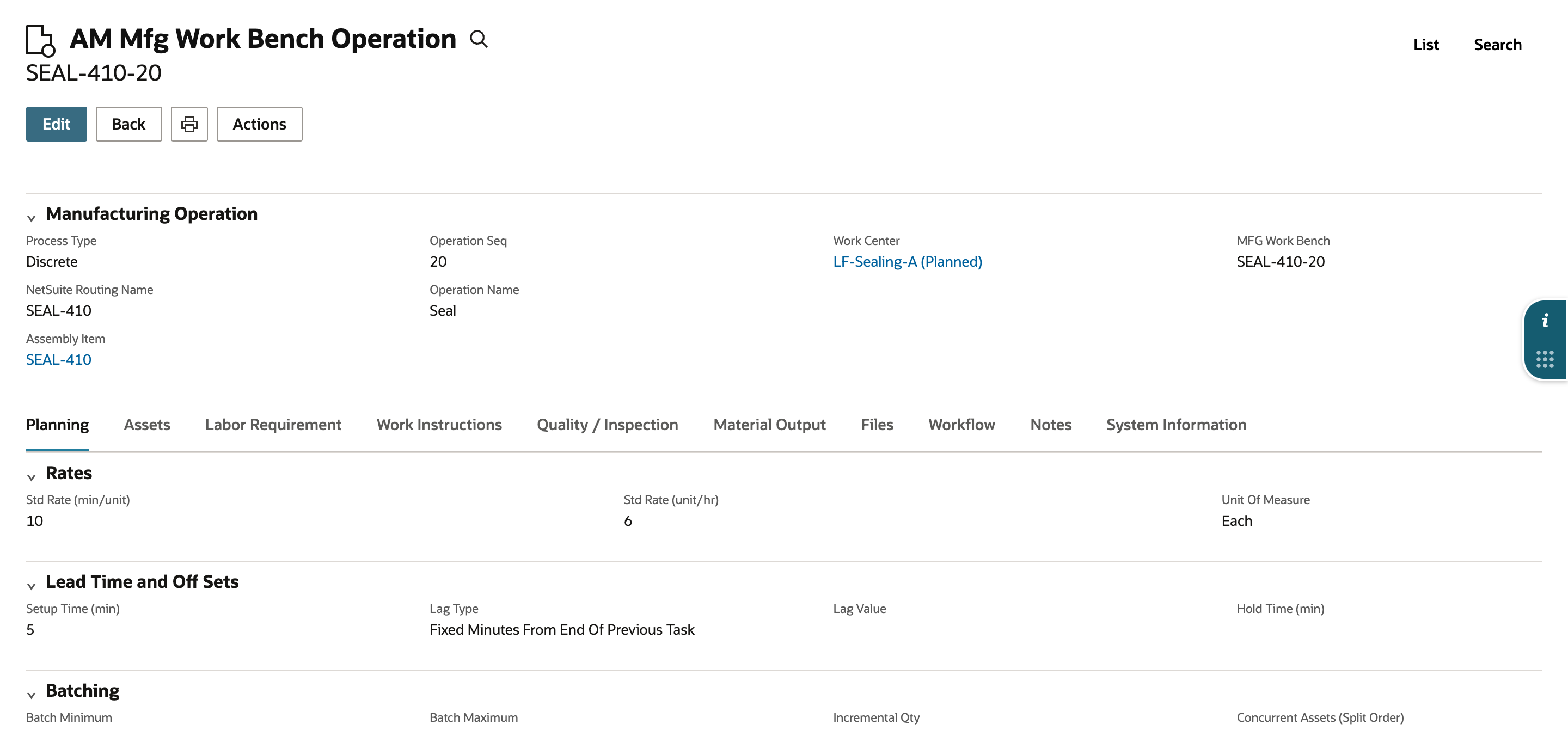 Saved AM Mfg Work Bench Operation SEAL-410-20 on its Planning tab. The tabs include Planning, Assets, Labor Requirement, Work Instructions, Quality / Inspection, Material Output, Files, Workflow, Notes and System Information.