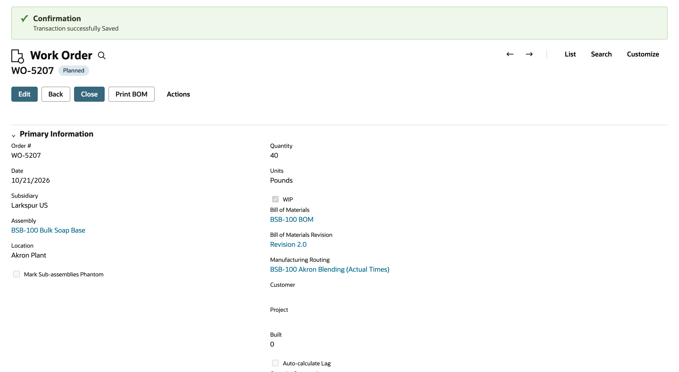 Saved NetSuite work order WO-5207 with status Planned, a Confirmation band, Location Akron Plant and Manufacturing Routing BSB-100 Akron Blending (Actual Times)
