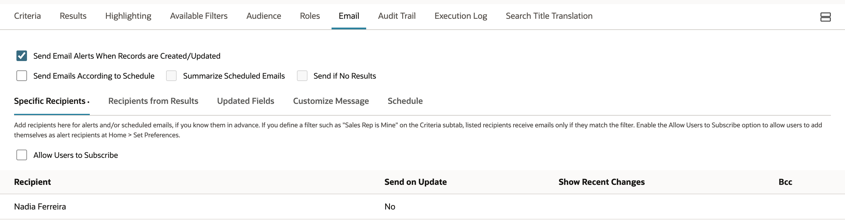 Email subtab of the saved search with Send Email Alerts When Records are Created/Updated checked and Nadia Ferreira under Specific Recipients with Send on Update No; an arrow points to the alert check box